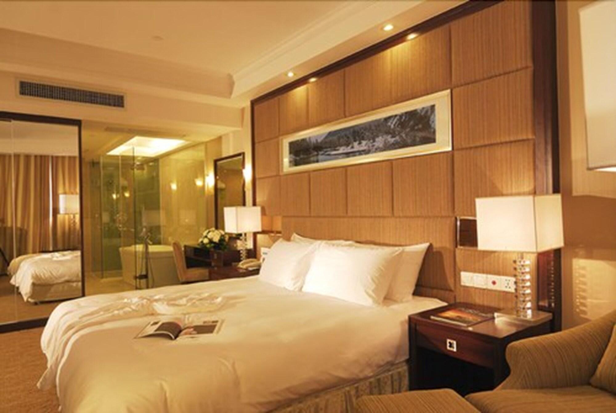 Poly Hotel Wuhan Quarto foto
